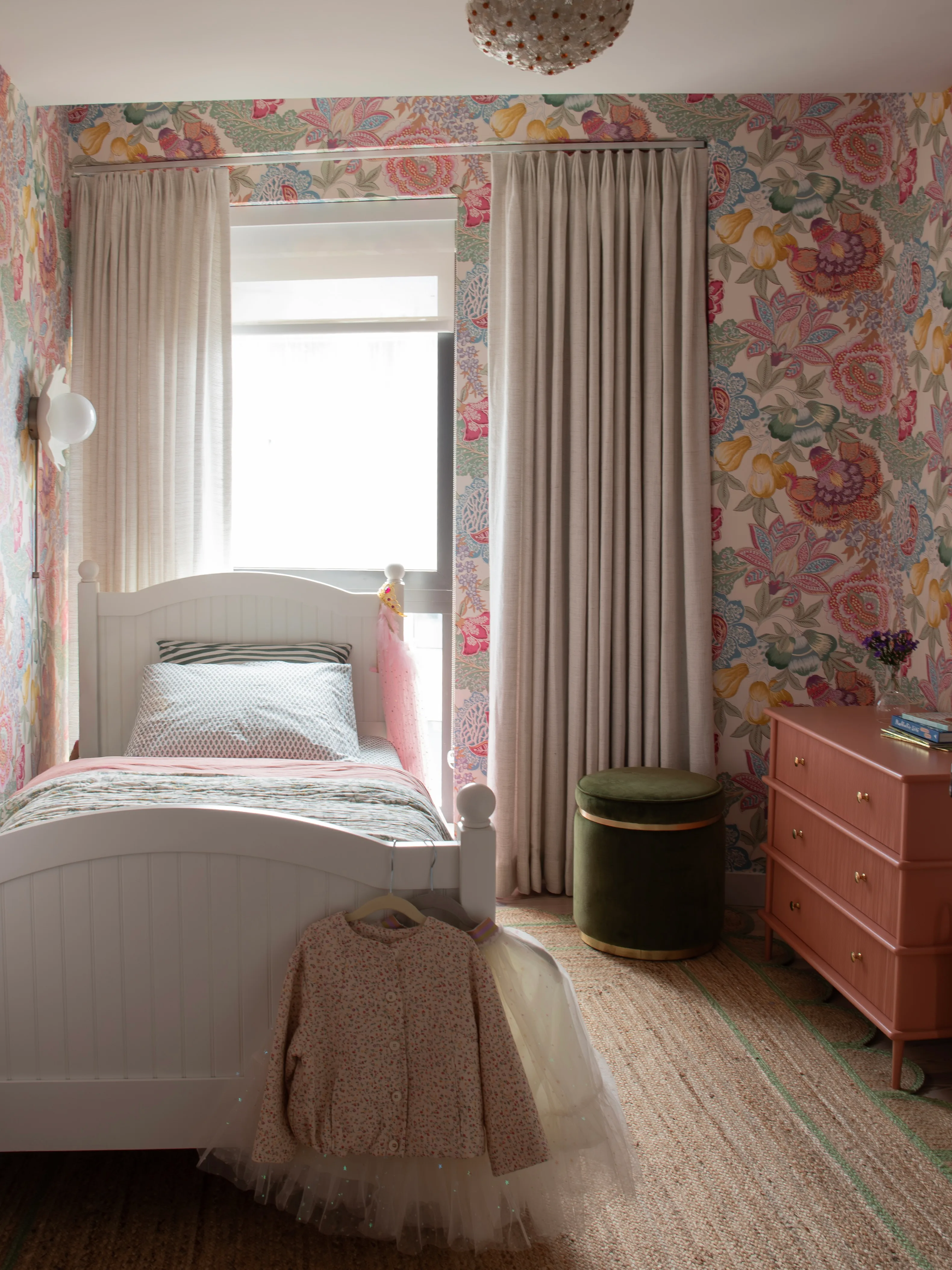 Powder room with wallpaper detail